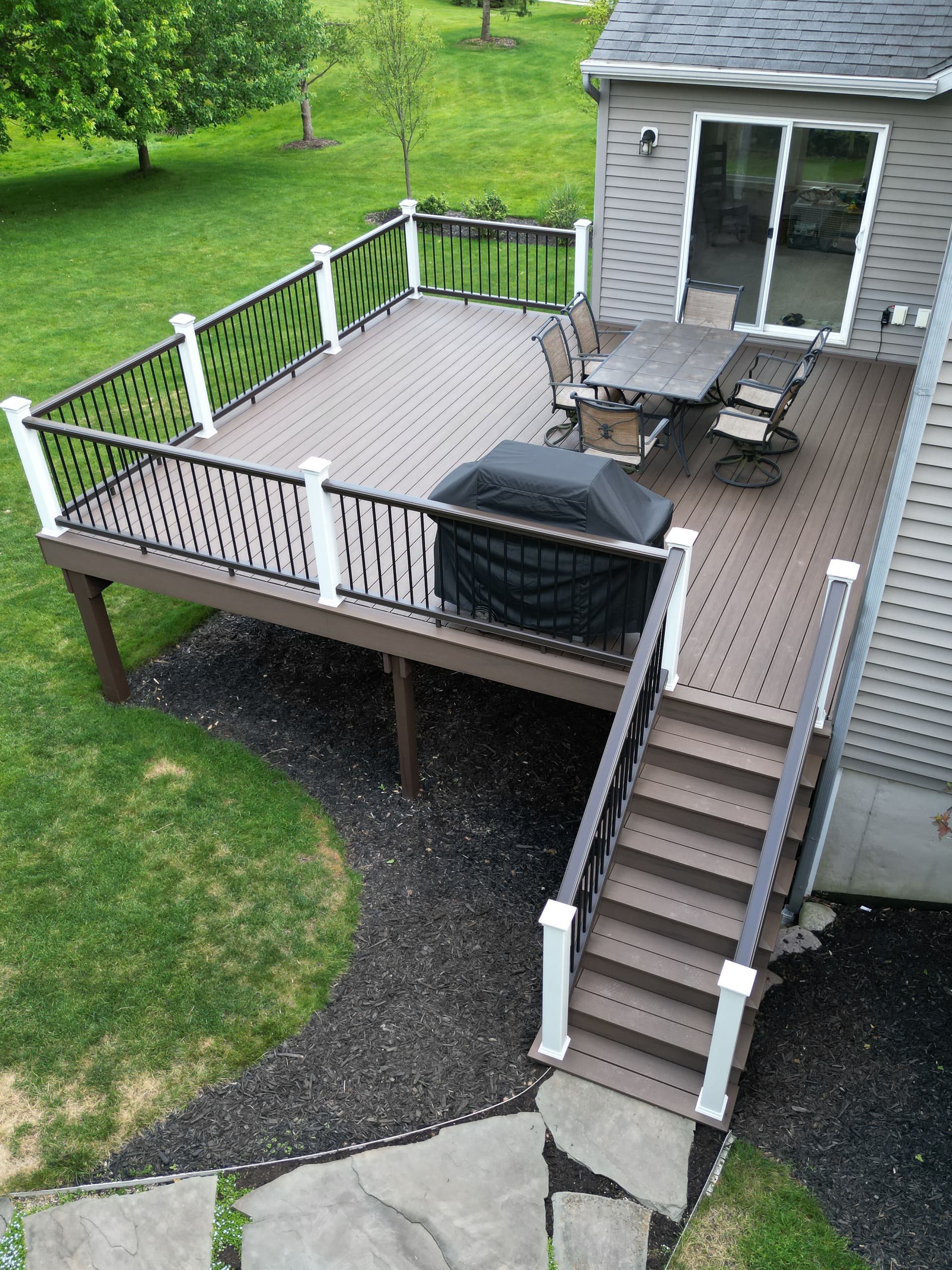 Low-Maintenance Backyard Deck Built with TimberTech Dark Cocoa image