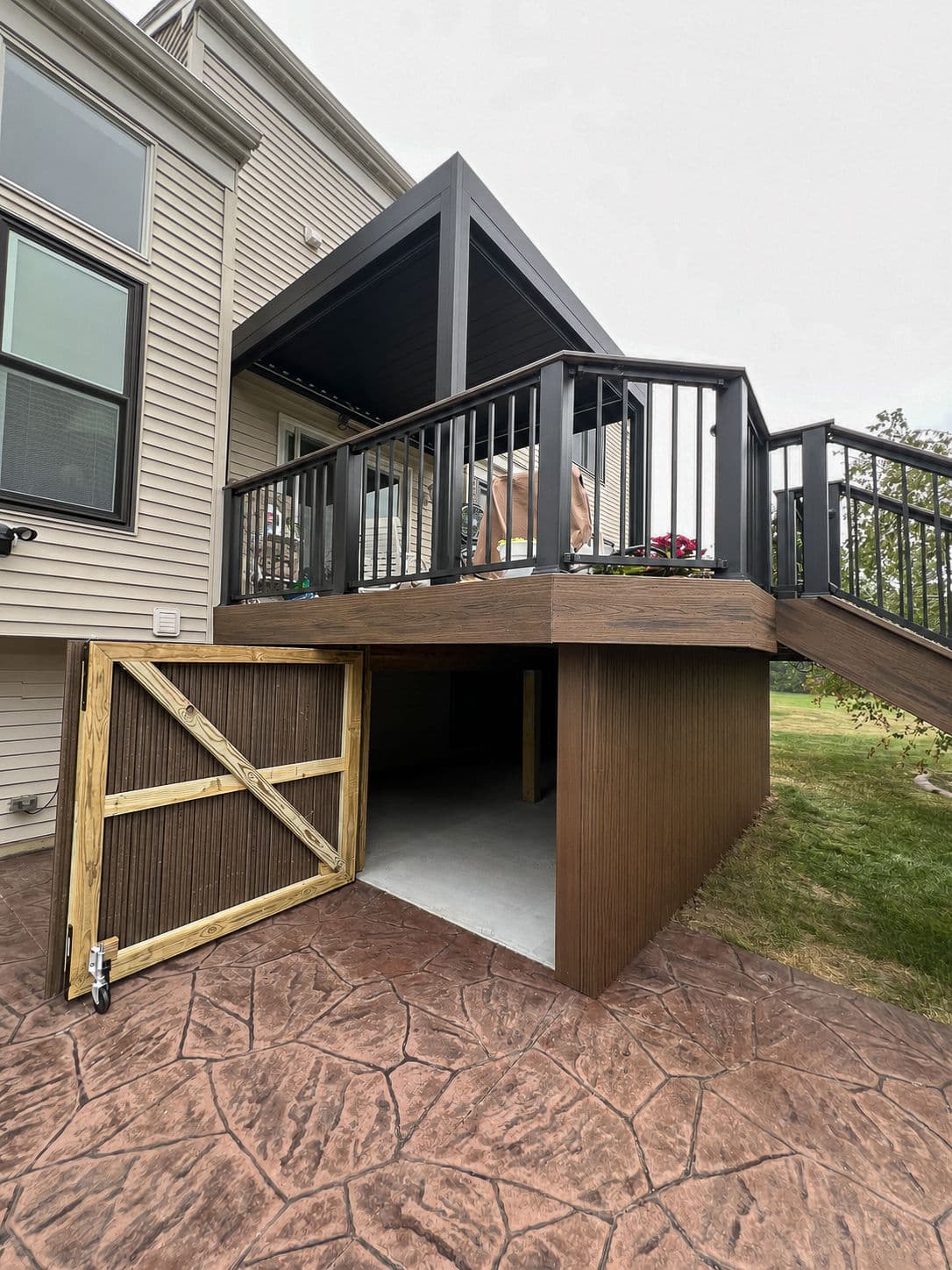 Under-Deck Storage Enclosure Built with Trex in Caledonia image