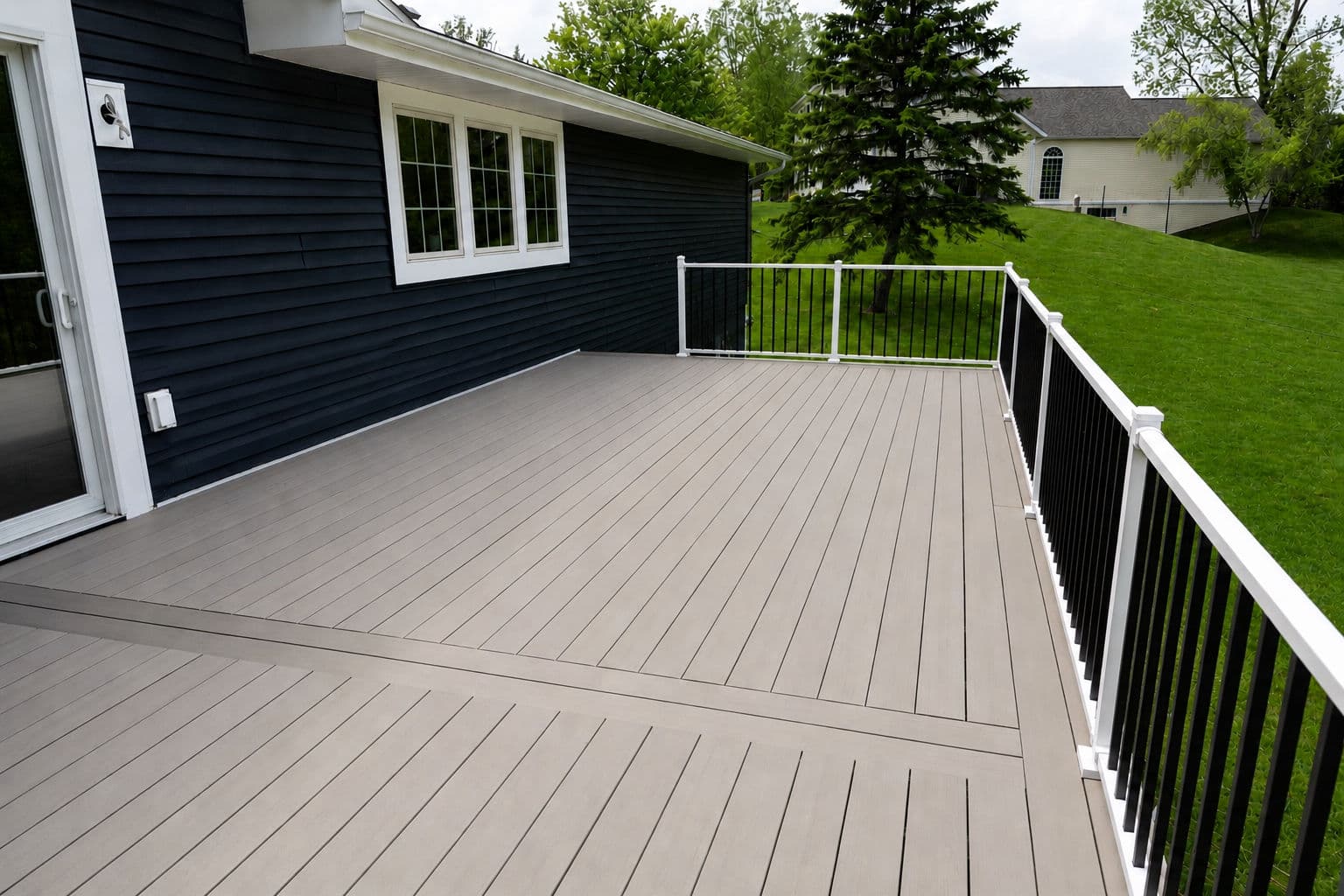 Gallery photos for 42-Foot TimberTech Deck with Stamped Concrete Patio Build: Image #1